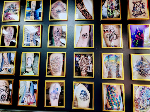 Explore tribal cross tattoo ideas, creative tattoo ideas in Buford, available at Wild Tribe Tattoos and Piercings