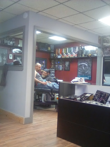 Explore letter tattoo cover up ideas, creative tattoo ideas in Lake Katrine, available at Marky Marks Tattoo Works