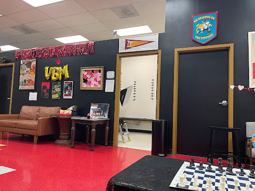 Explore ribbon tattoo ideas, creative tattoo ideas in Santa Clara, available at Vampire Battle Mansion Tattoo and Piercing