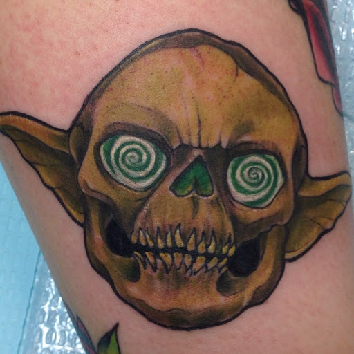 Explore birth month flower tattoo ideas, creative tattoo ideas in Saint Paul, available at Black Coffin Tattoo