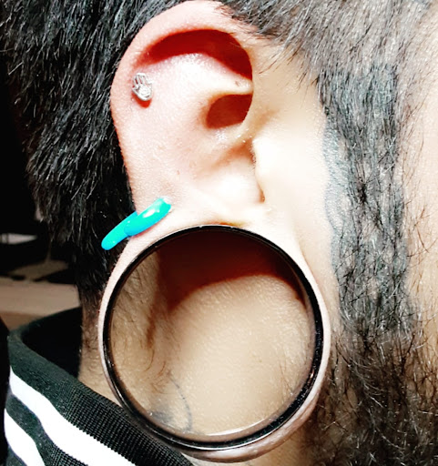 Explore thigh tattoo ideas for women, creative tattoo ideas in El Paso, available at Whiskeys piercings