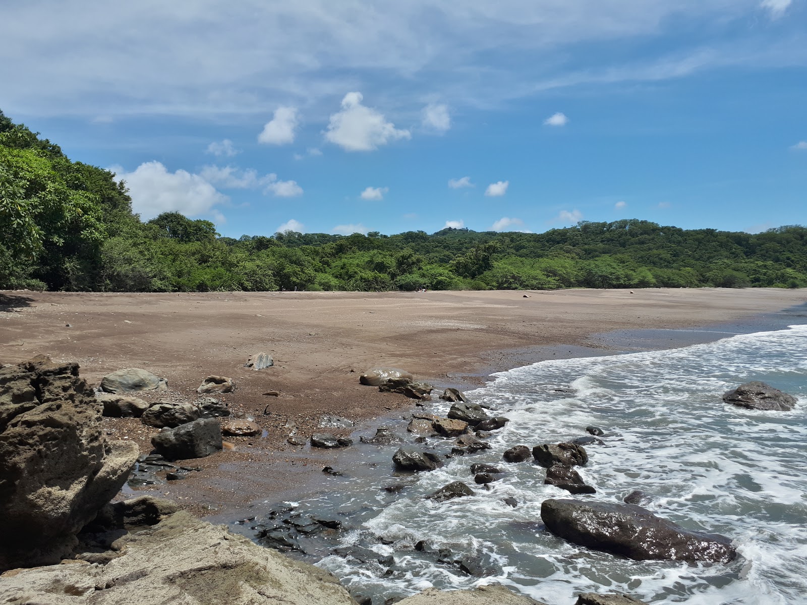 Φωτογραφία του Playa Escameca με μπεζ άμμος επιφάνεια