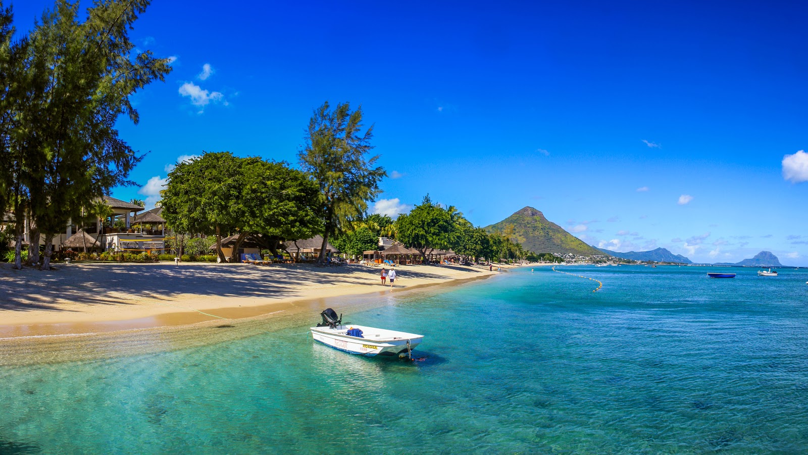 Fotografija Wolmar Beach in naselje