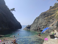 Photo de Porto Pidocchio Beach et le règlement
