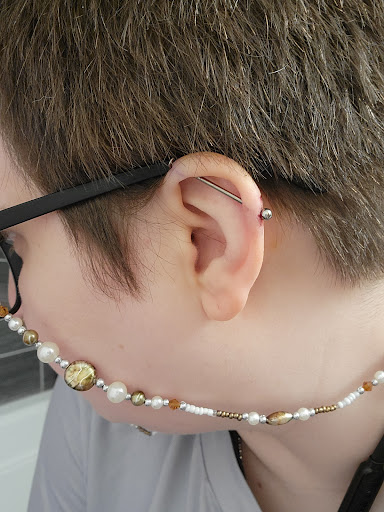 Explore dragon head tattoo ideas, creative tattoo ideas in Minneapolis, available at Sacred Siren Tattoo & Art Parlor