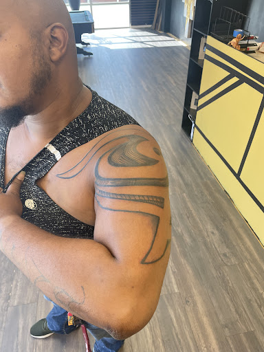 Explore hand mens tattoo ideas, creative tattoo ideas in Hampton, available at Matriarch Gallery