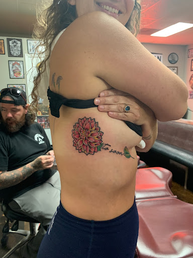 Explore saint tattoo ideas, creative tattoo ideas in Morehead City, available at Diamond City Tattoo