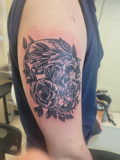 Explore neck name tattoo ideas, creative tattoo ideas in Ozark, available at Tooth & Nail Tattoo & Piercing