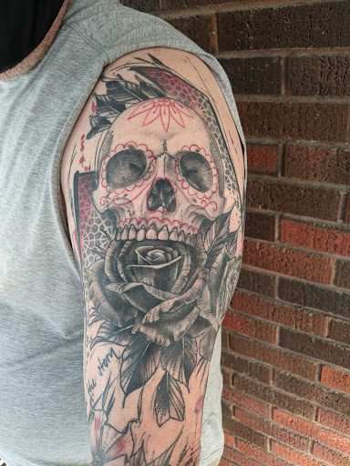 Explore resilience symbol tattoo ideas, creative tattoo ideas in Plymouth, available at North Main Tattoo Studio & Art Gallery