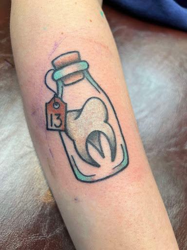 Explore marigold tattoo ideas, creative tattoo ideas in Nashville, available at RedBird Tattoo