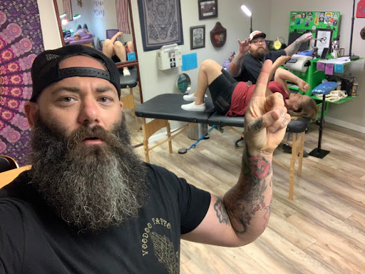Explore chest arm tattoo ideas, creative tattoo ideas in Gautier, available at Voodoo Tattoo