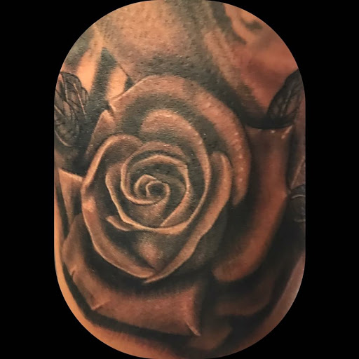 Explore cherry blossom tattoo ideas, creative tattoo ideas in Copperas Cove, available at Black Moon Tattoo Company