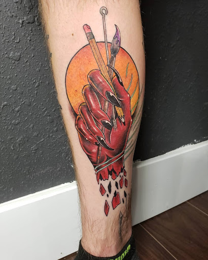 Explore mass effect tattoo ideas, creative tattoo ideas in Orem, available at Hearts and Hands Tattoo and Piercing