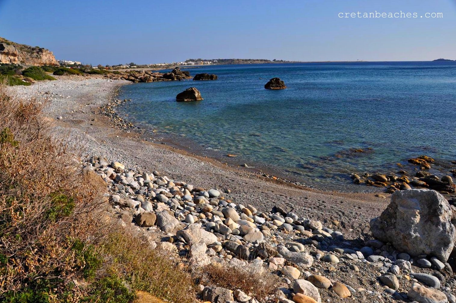 Foto av Beach Kalamia med stenar yta