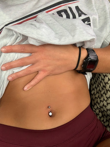 Explore december birth flower tattoo ideas, creative tattoo ideas in Clarksville, available at Dark Raine Tattoo