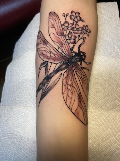 Explore cherub angel tattoo ideas, creative tattoo ideas in Peabody, available at Thousand Needles Tattoo