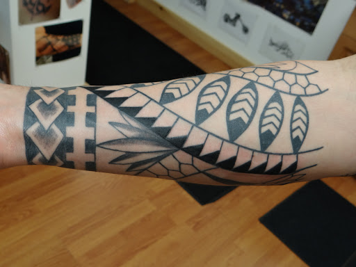 Explore dominican flag tattoo ideas, creative tattoo ideas in Hooksett, available at Skin Deep Tribal Tattoo