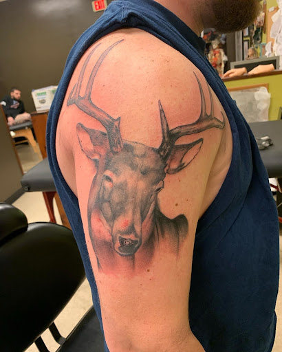 Explore wrap around arm tattoo ideas, creative tattoo ideas in Fogelsville, available at Gilded Heron Tattoo