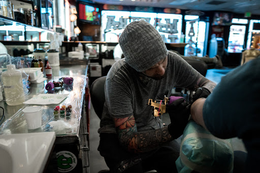 Explore stomach tattoo ideas, creative tattoo ideas in Denver, available at Mantra Tattoo and Piercing