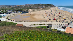 Foto von Praia da Areia Branca mit lange, gerade küste