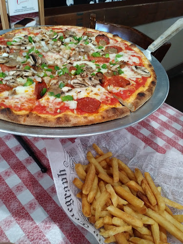 #9 best pizza place in Henderson - Carmine's Pizza Kitchen