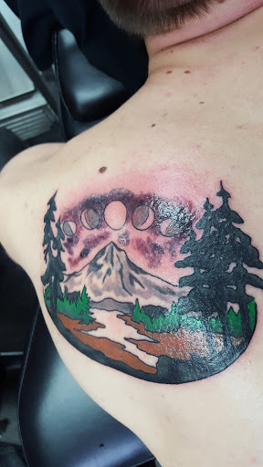 Explore bear tattoo ideas for guys, creative tattoo ideas in Springfield, available at Area 51 Tattoo