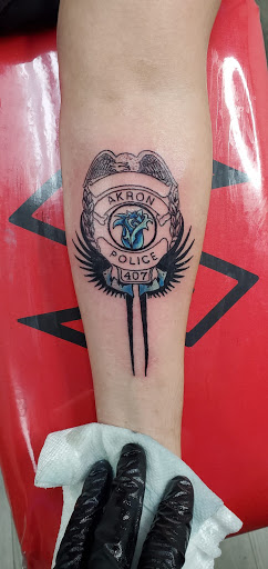 Explore christmas tree tattoo ideas, creative tattoo ideas in Cuyahoga Falls, available at Sick Skins Skin Art Studio