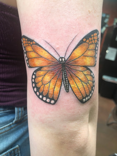 Explore tattoo ideas for deceased brother, creative tattoo ideas in Sedona, available at Physical Graffiti Tattoo