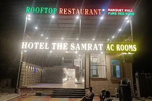 HOTEL THE SAMRAT & ROOFTOP FAMILY RESTAURANT image