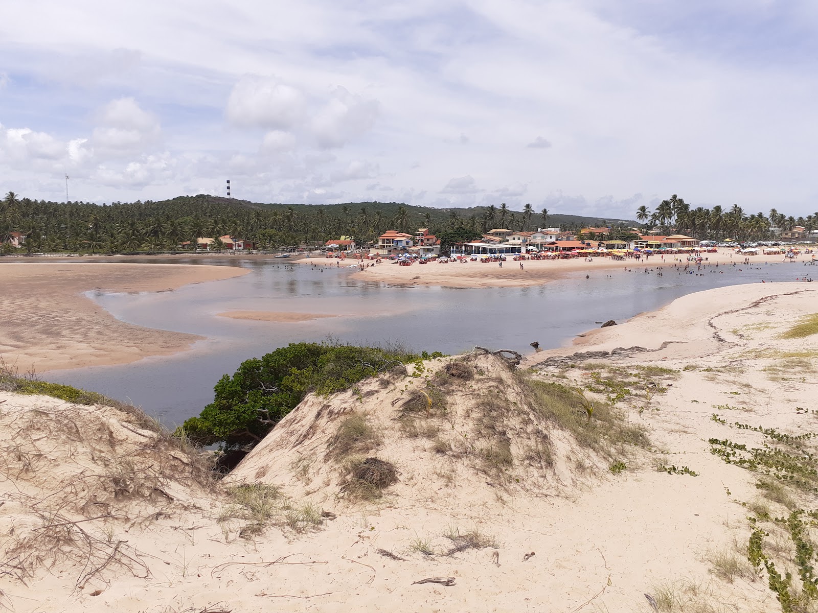 Photo of Barra do Itariri Beach and the settlement