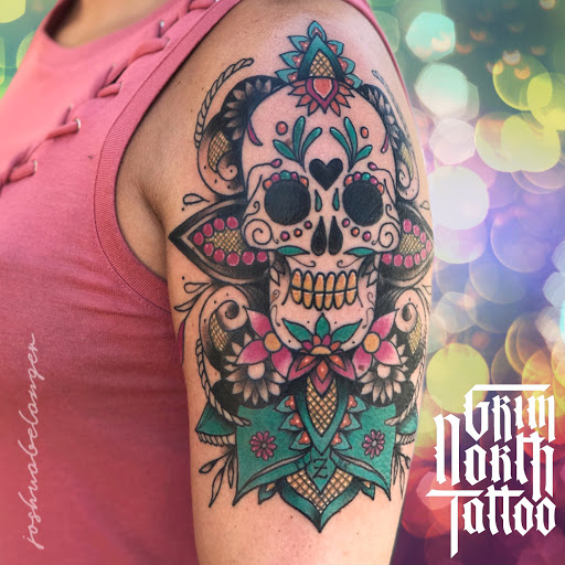 Explore blacked out tattoo ideas, creative tattoo ideas in Portsmouth, available at Grim North Tattoo and Piercing