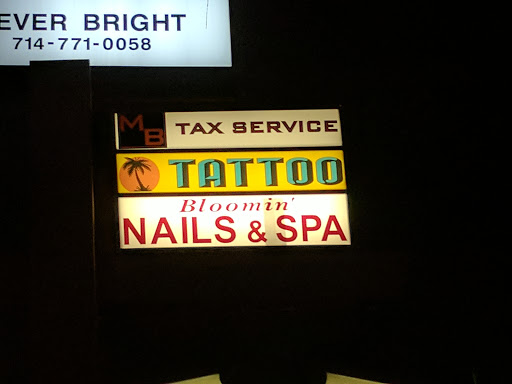 Find mom of 4 tattoo ideas for your next unique tattoo in Orange at Black Palm Tattoo