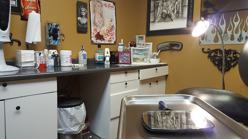 Explore bodybuilding tattoo ideas, creative tattoo ideas in Mandan, available at Dolls Studios Tattoo & Piercing