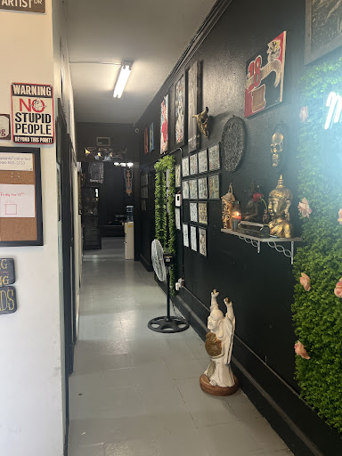 Explore dark tattoo sleeve ideas, creative tattoo ideas in Mcallen, available at House of Tattoos