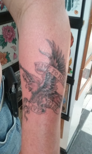 Explore neck tattoos ideas, creative tattoo ideas in Ormond Beach, available at Tropical Tattoo Inc