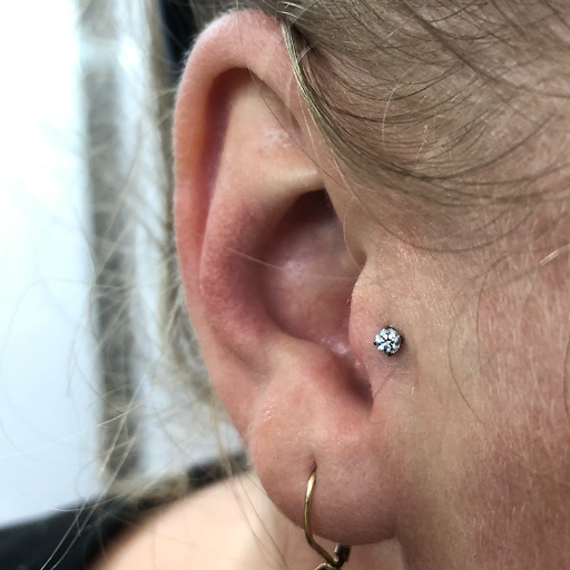 Explore upper back tattoo cover up ideas, creative tattoo ideas in Myrtle Beach, available at Elite Body Piercing