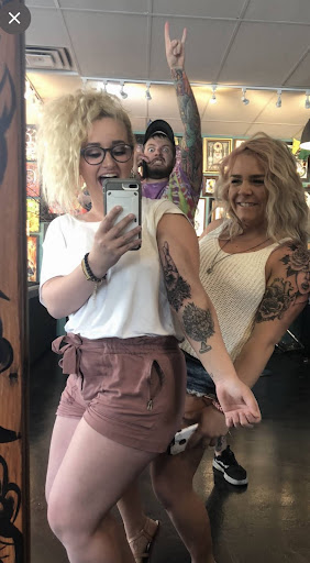 Explore joker hand tattoo ideas, creative tattoo ideas in Golden, available at Great Day Tattoo