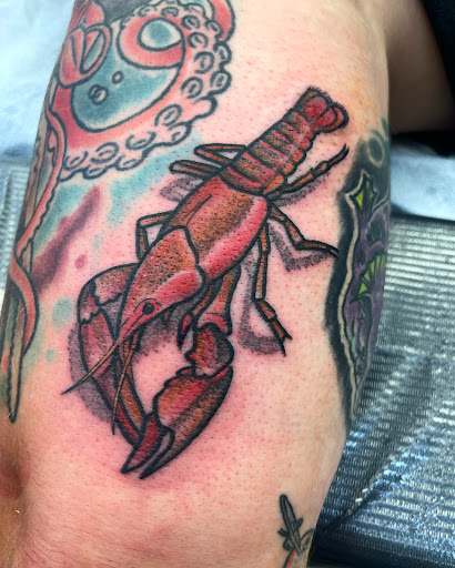 Explore manatee tattoo ideas, creative tattoo ideas in Madison, available at Lucky Dog Tattoo