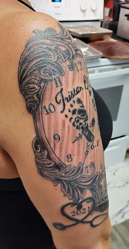 Explore crucifix tattoo ideas, creative tattoo ideas in Gulfport, available at Jack & Dianes Tattoo