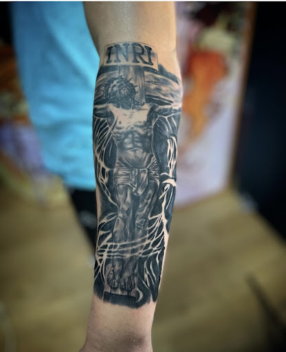 Explore tattoo ideas basketball, creative tattoo ideas in Columbus, available at Infamous Ink Tattoos and Piercings