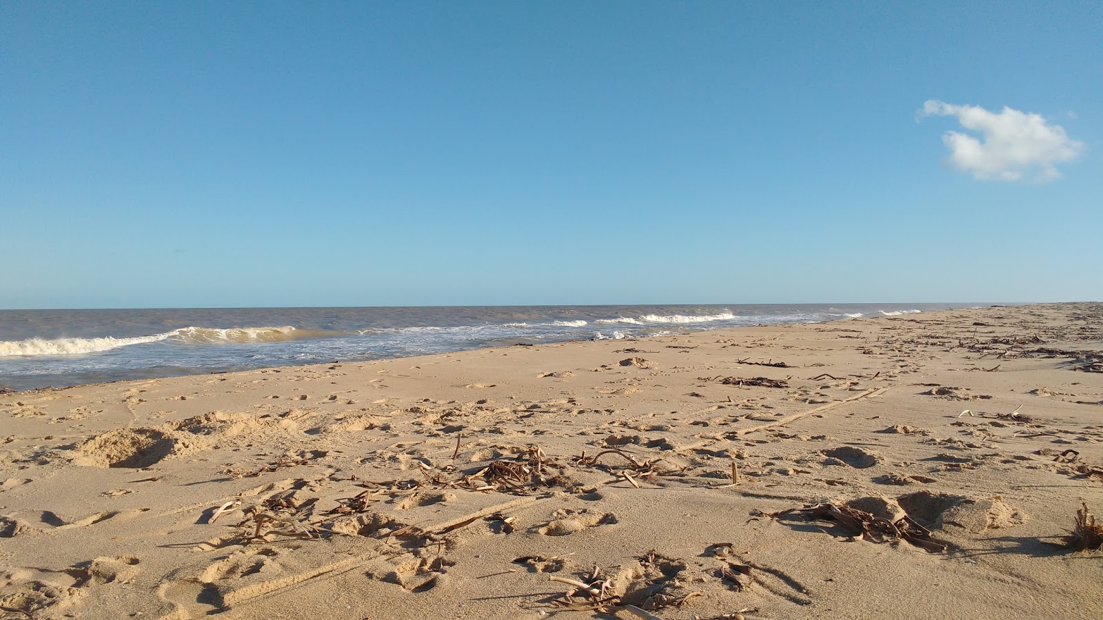 Photo of Xexe Beach and the settlement