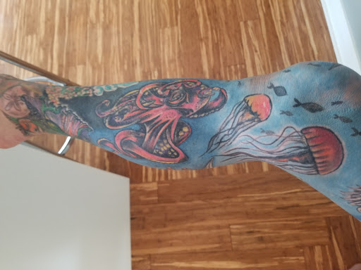 Explore arsenal tattoo ideas, creative tattoo ideas in Barberton, available at Magic City Tattoo Company
