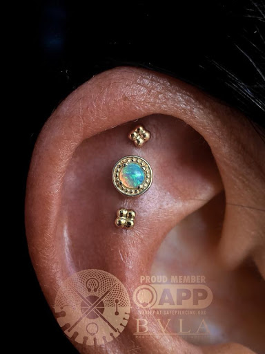 Explore lower back cover up tattoo ideas, creative tattoo ideas in Akron, available at Good Life Body Piercing and Fine Jewelry