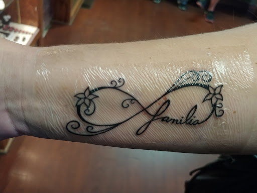 Explore bike tattoo ideas, creative tattoo ideas in Saint Cloud, available at Olde Town Tattoo and Piercing