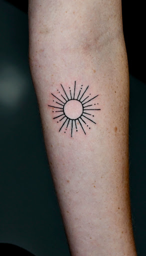 Explore purple flower tattoo ideas, creative tattoo ideas in Saint Petersburg, available at Phoebus Tattoos