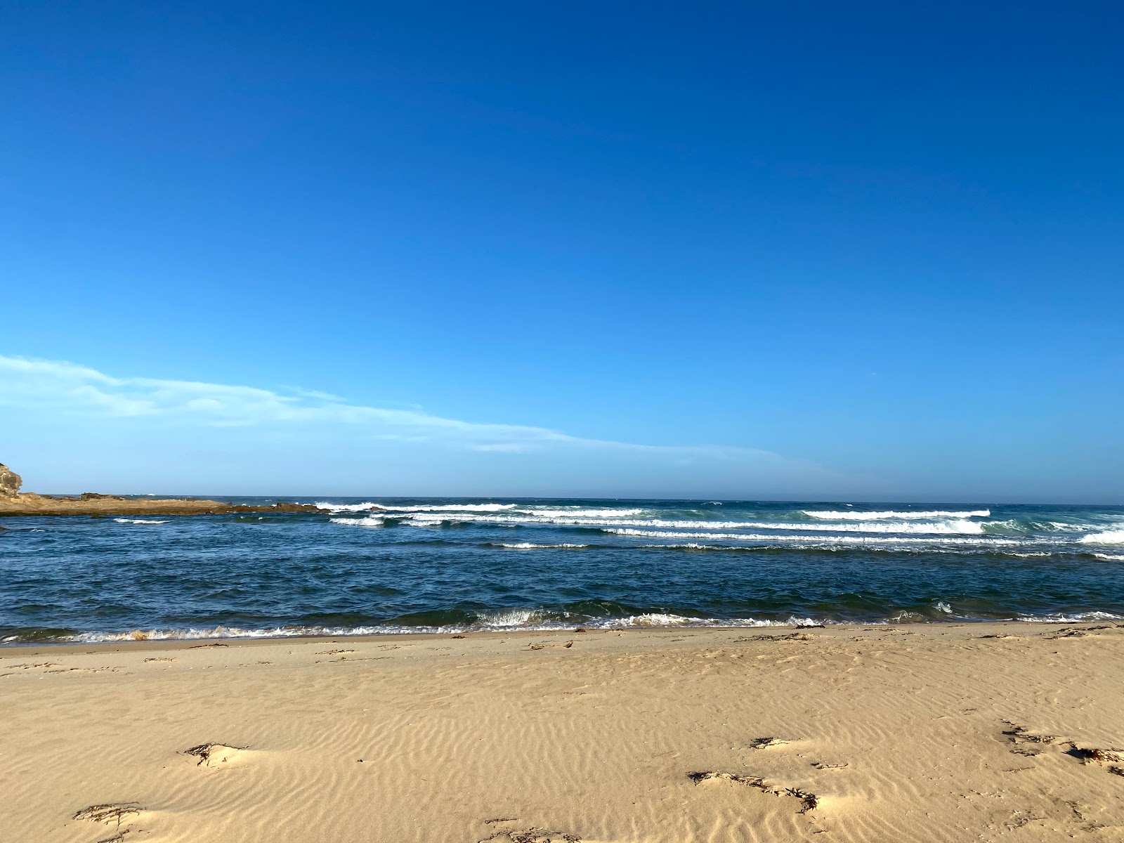 Foto av Bunga Beach med lång rak strand