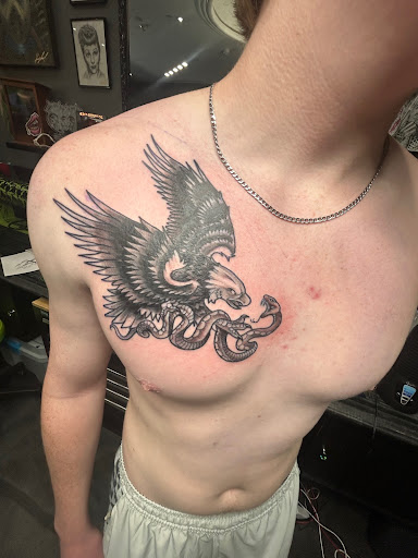 Explore tattoo chest cover up ideas, creative tattoo ideas in Peoria, available at Modern Ink Tattoo