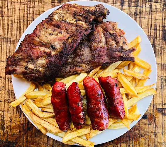 Cavernicola Parrilladas y carnes asadas - Restaurante