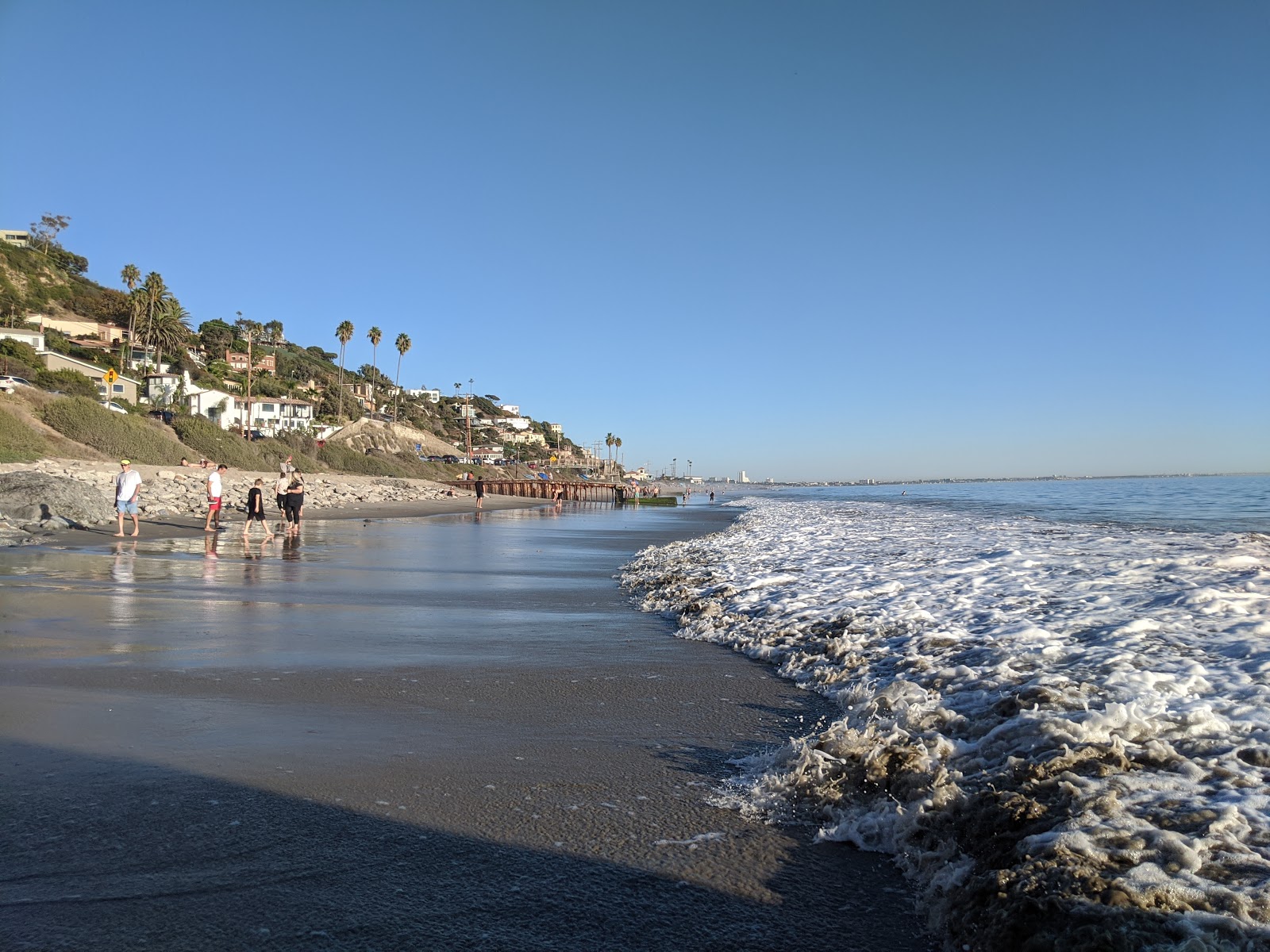 Castle Rock Beach'in fotoğrafı düz ve uzun ile birlikte