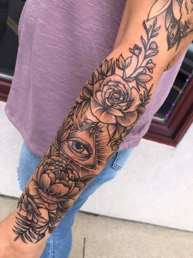 Explore ski tattoo ideas, creative tattoo ideas in Angola, available at Royal Black Tattoo, llc